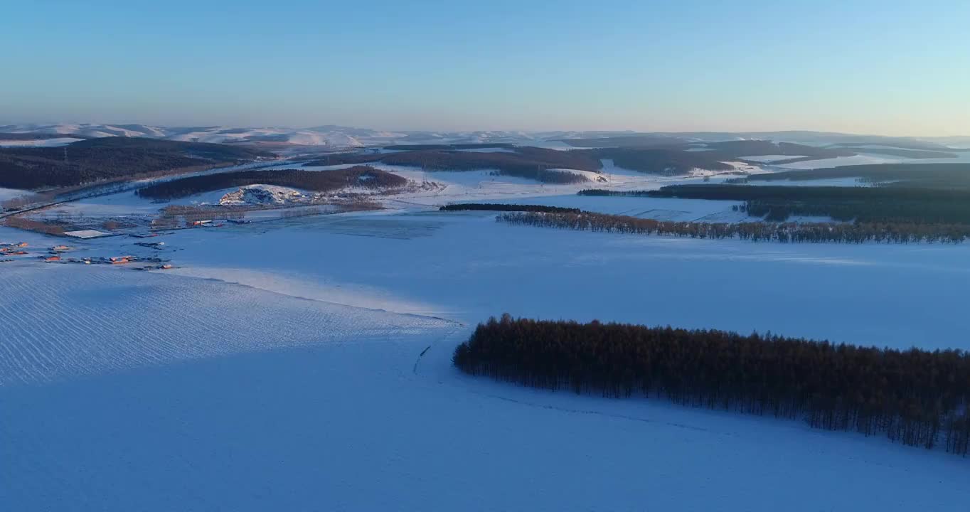 航拍呼伦贝尔垦区冬季雪原风光视频素材