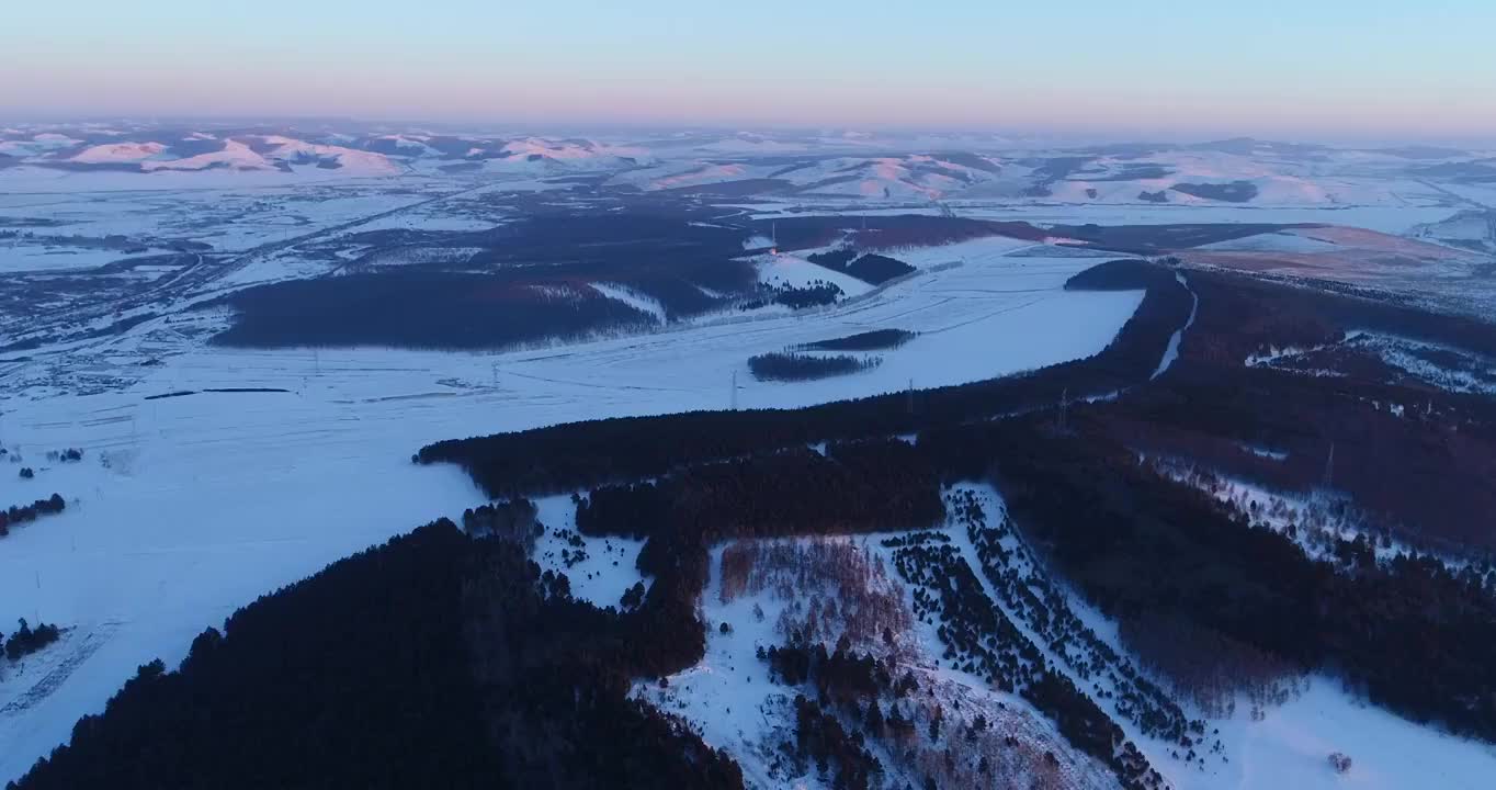 航拍呼伦贝尔垦区冬季雪原风光视频素材