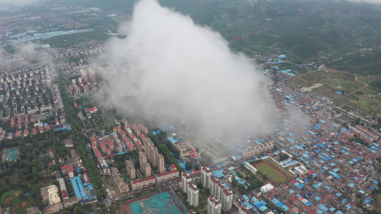 航拍夏天大雨过后城市天空穿云视频素材