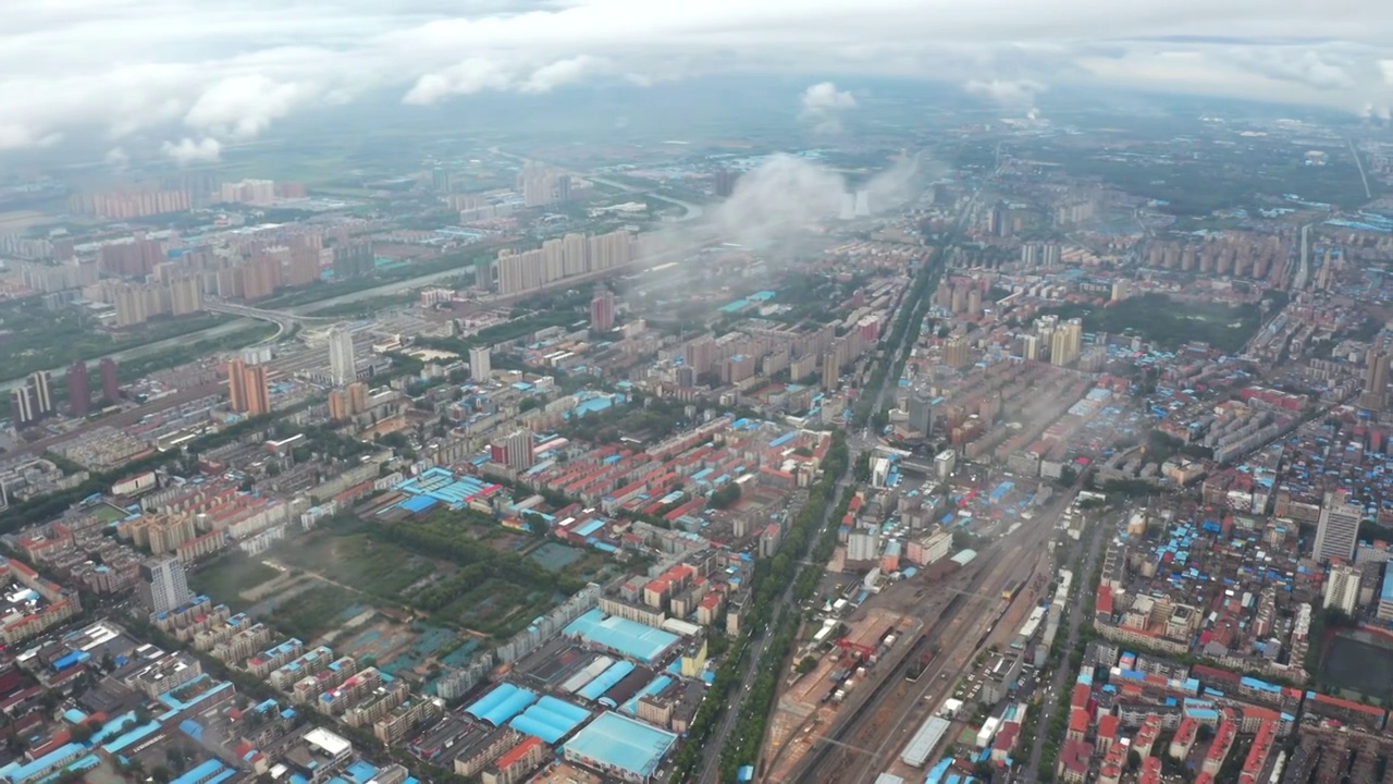 航拍夏天大雨过后城市天空穿云视频素材