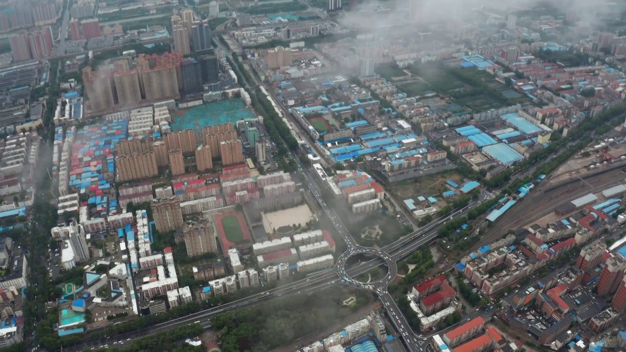 航拍夏天大雨过后城市天空穿云视频素材