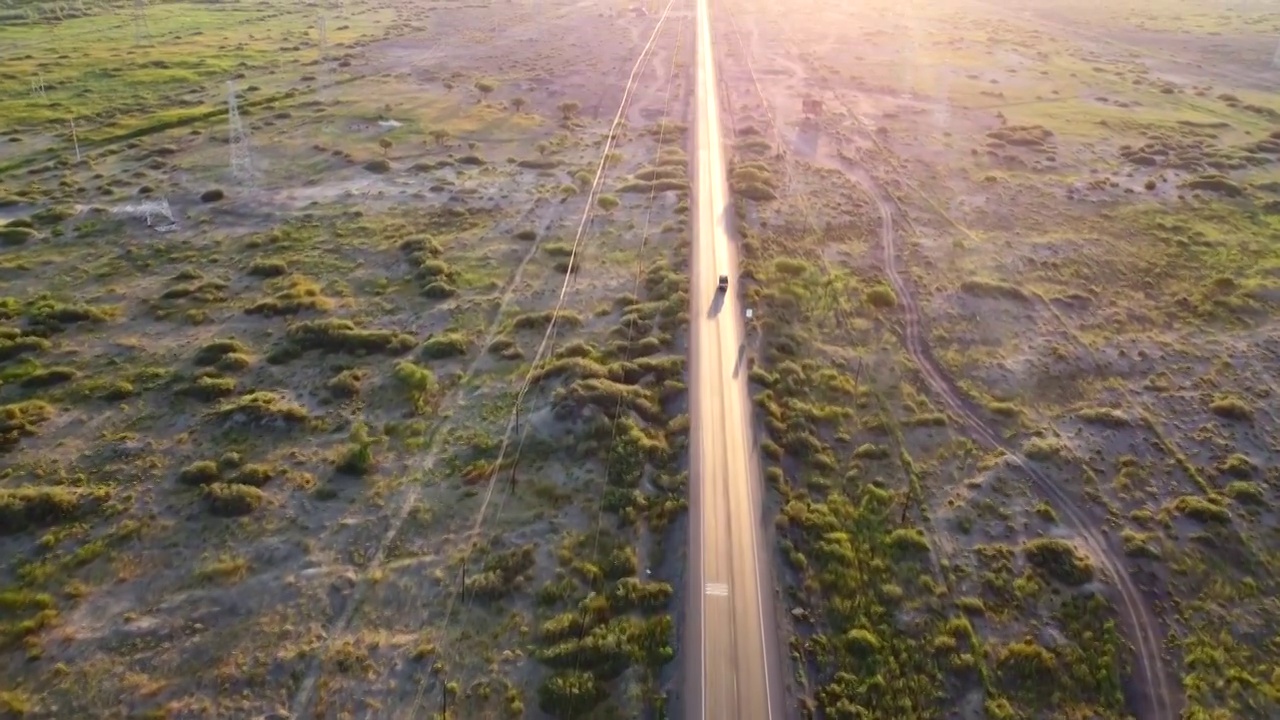 航拍行驶在笔直公路上的货车视频素材