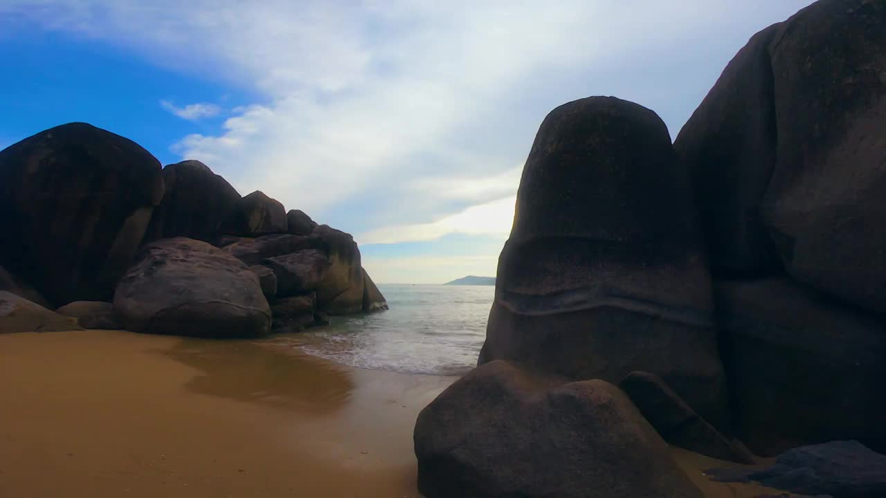 三亚海角天涯海边沙滩日落光晕视频素材