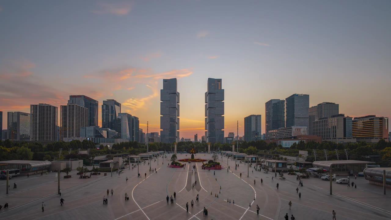河南郑州东站双子塔绿地中心日转夜延时摄影视频素材画面1