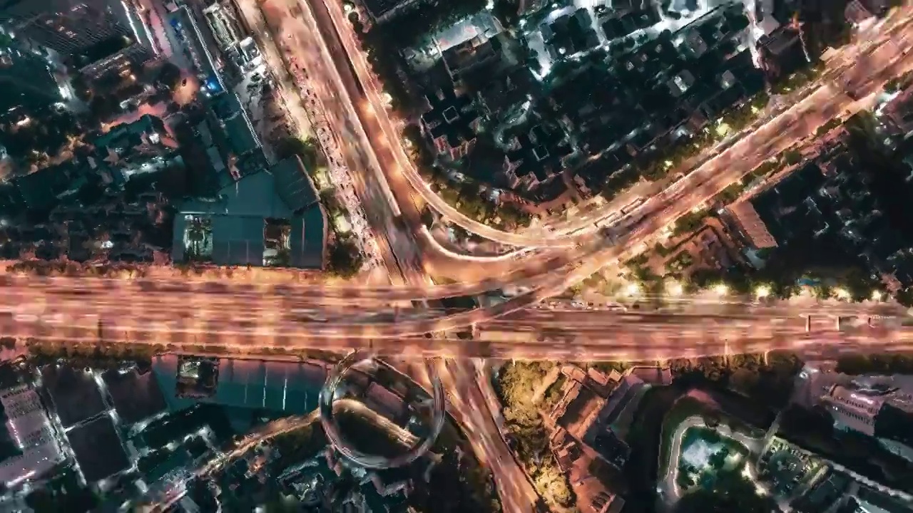 航拍俯视城市夜景立交桥光轨车流橙色视频素材