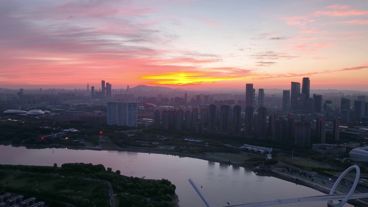 航拍日出火烧云下的南京河西商业区视频素材