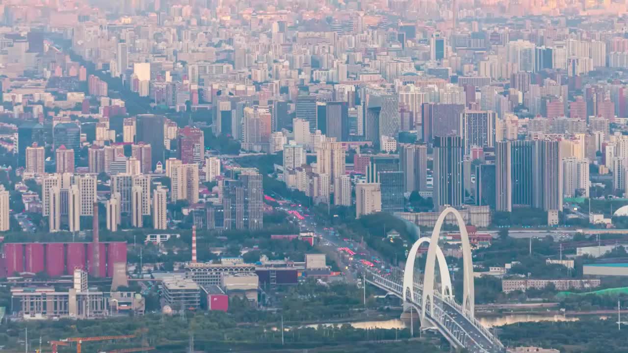 航拍视角下的北京首钢大桥道路日转夜延时摄影视频素材