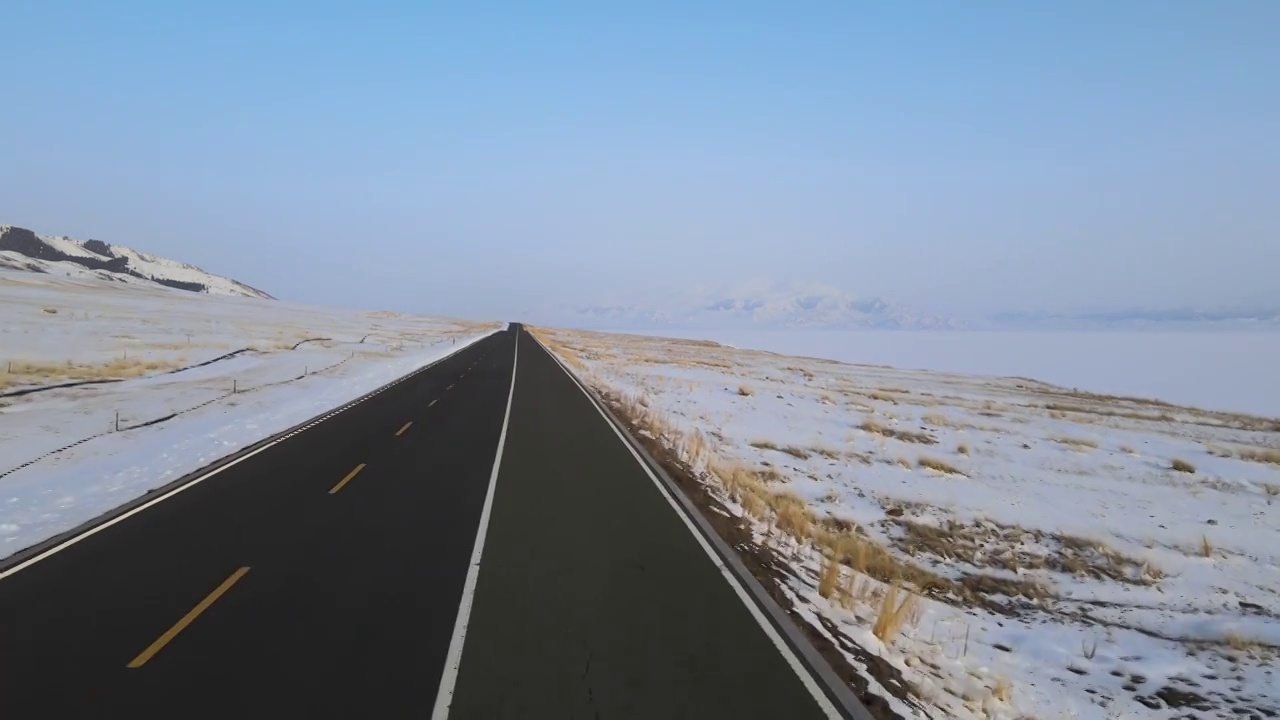 航拍下雪后的新疆伊犁风景视频素材