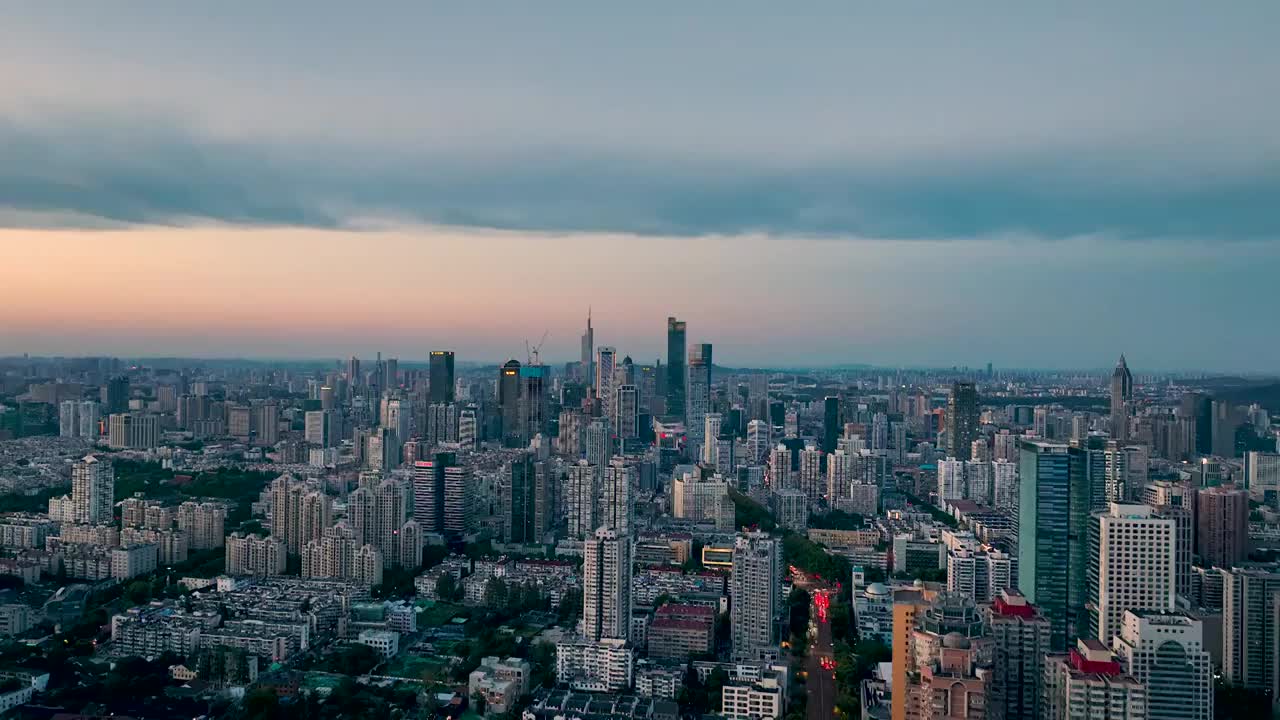 航拍落日蓝调时的南京新街口建筑群视频素材