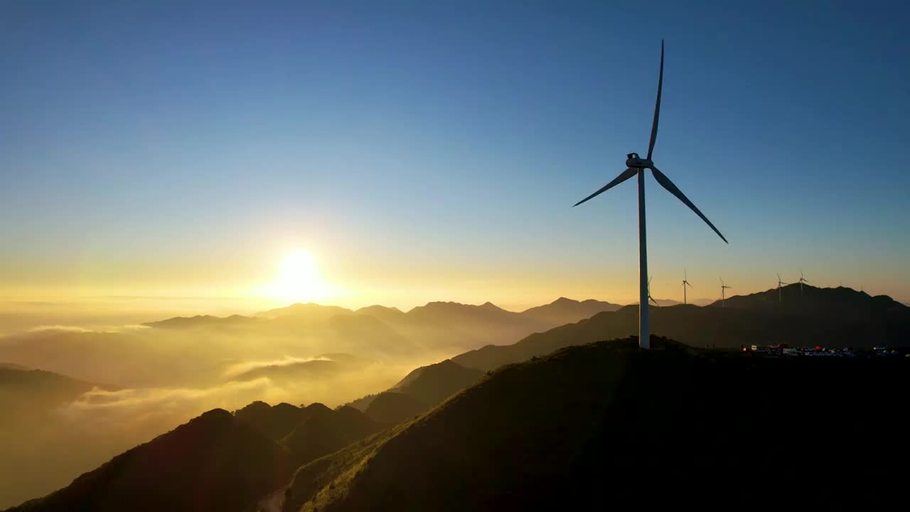 航拍山顶风车日出云海视频素材