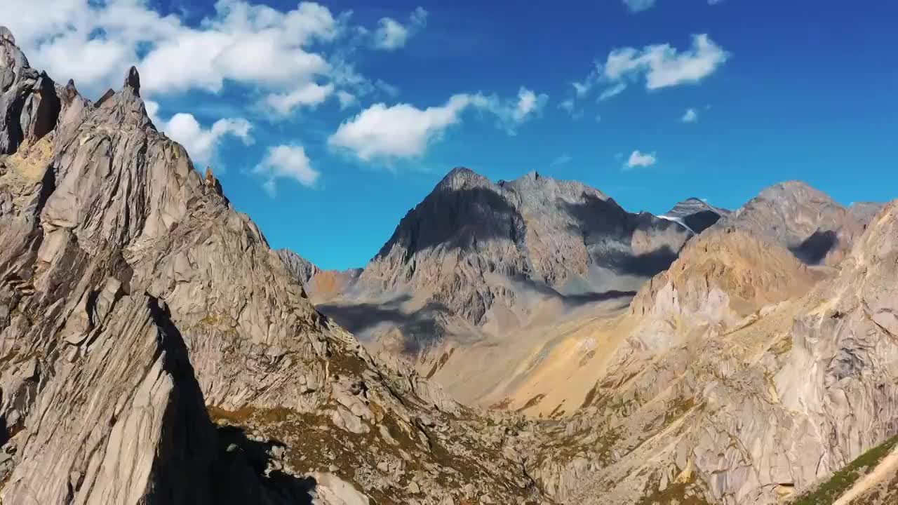 航拍高原山脉山川山峰山顶蓝天白云风光视频素材