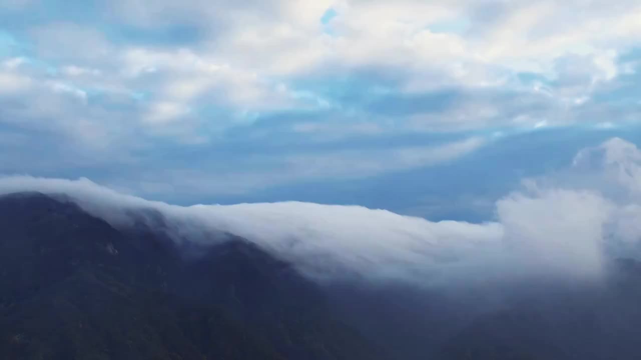 云海瀑布漫过高山飞流直下视频素材