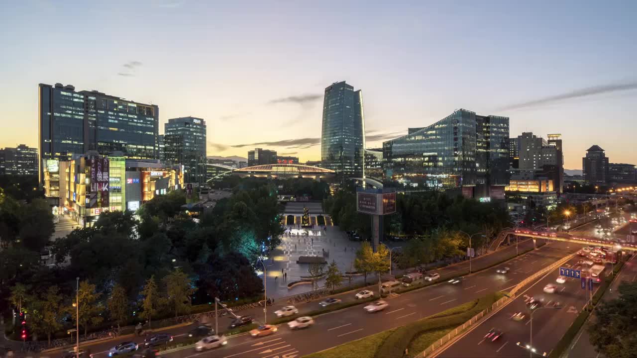 北京海淀中关村商业街建筑道路车流日落夜景延时摄影视频素材