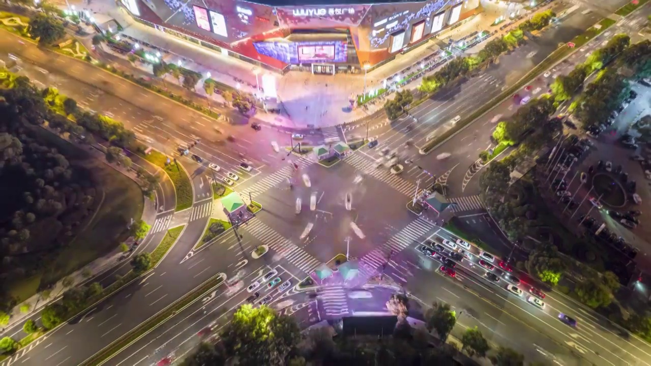 浙江义乌吾悦广场城市交通夜景车流人流航拍延时摄影视频素材