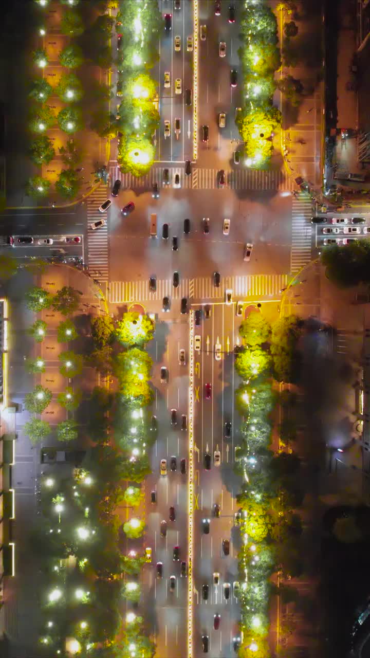 闹市区城市公路路口夜景航拍视频素材