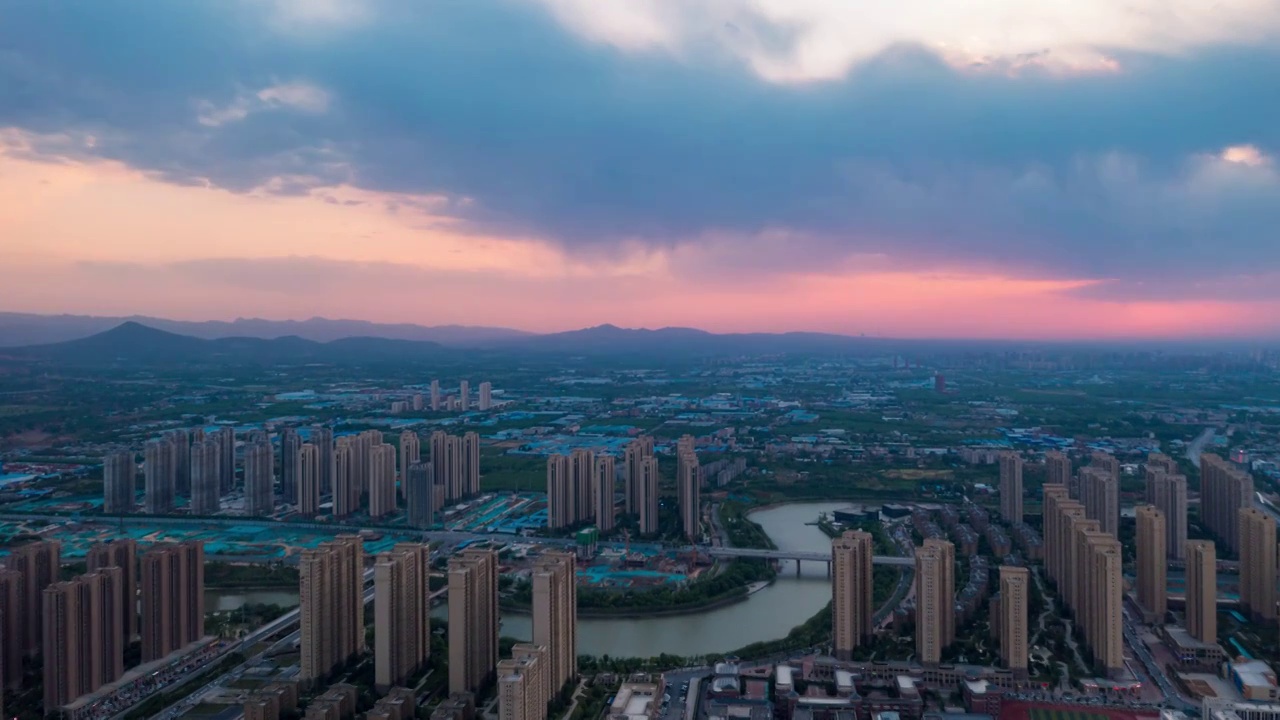 航拍荥阳瀚宇天悦湾城市落日延时视频素材