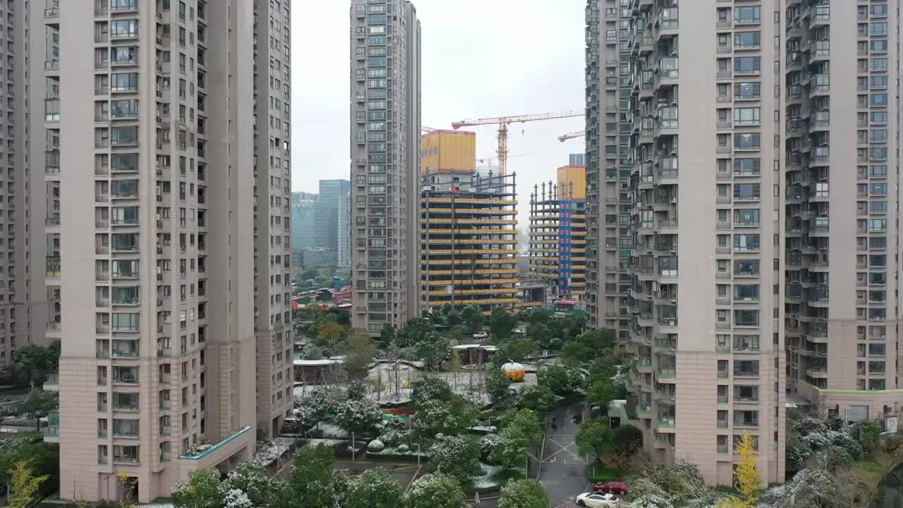 航拍杭州临平城市建筑风光雪景鸟瞰图视频素材