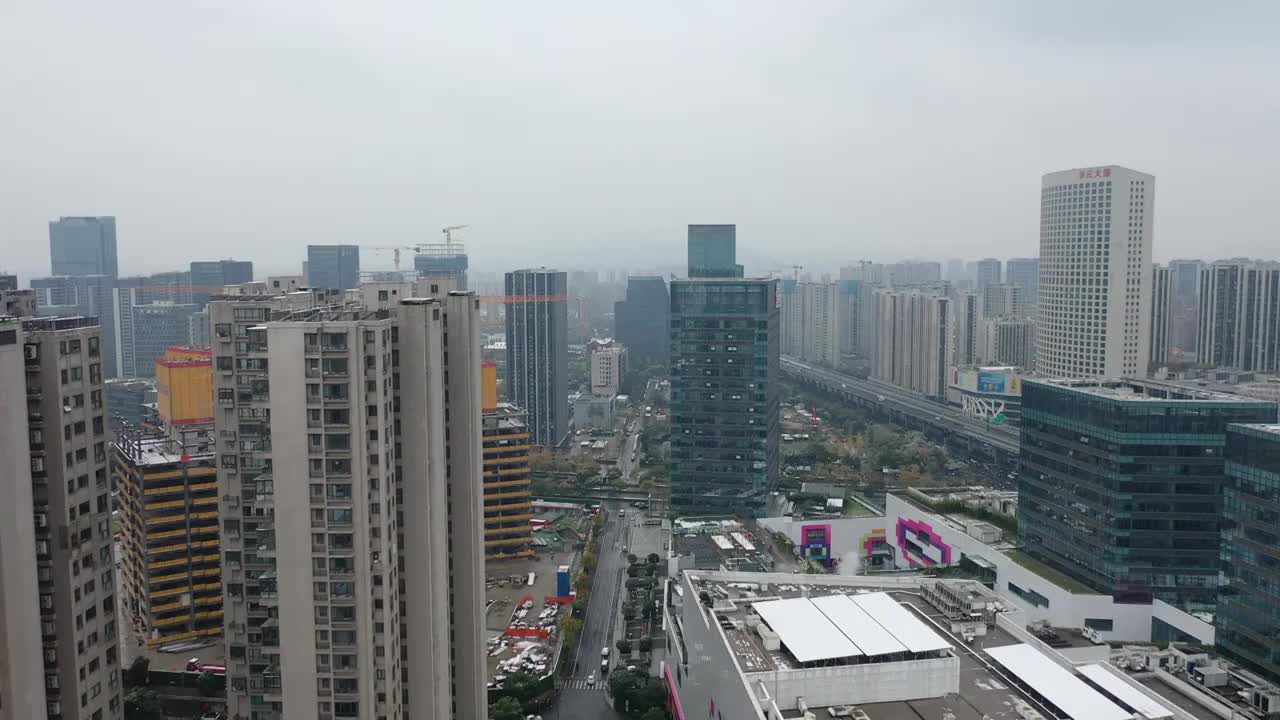 航拍杭州临平城市建筑风光雪景鸟瞰图视频素材