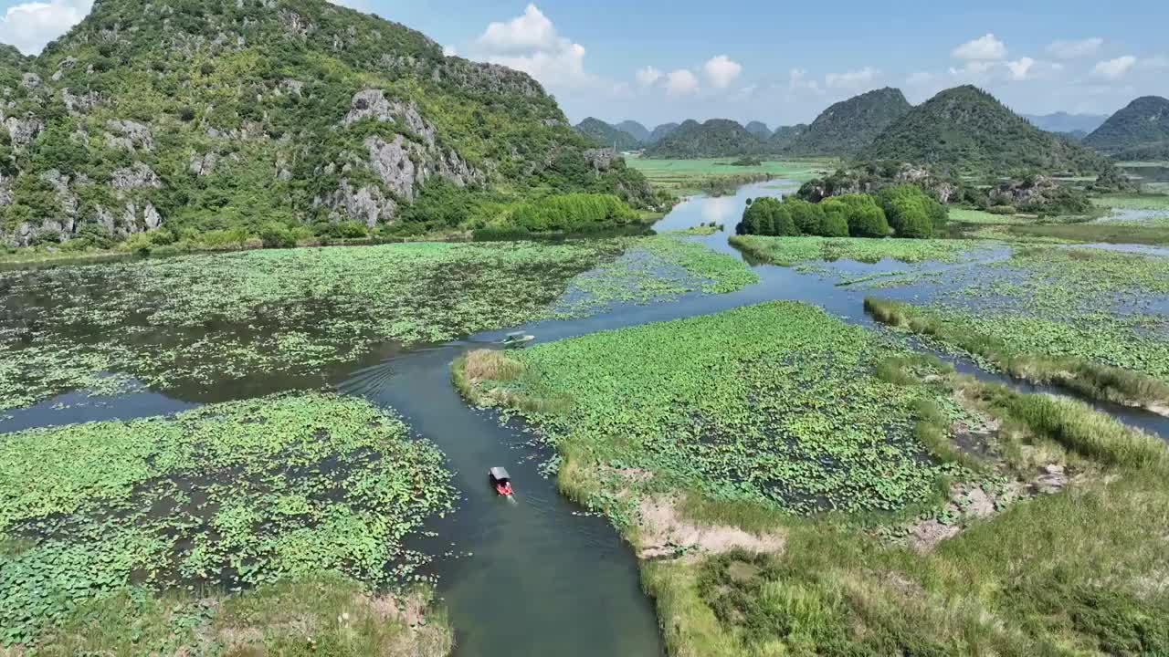 云南文山普者黑仙人洞湖游船航拍视频素材