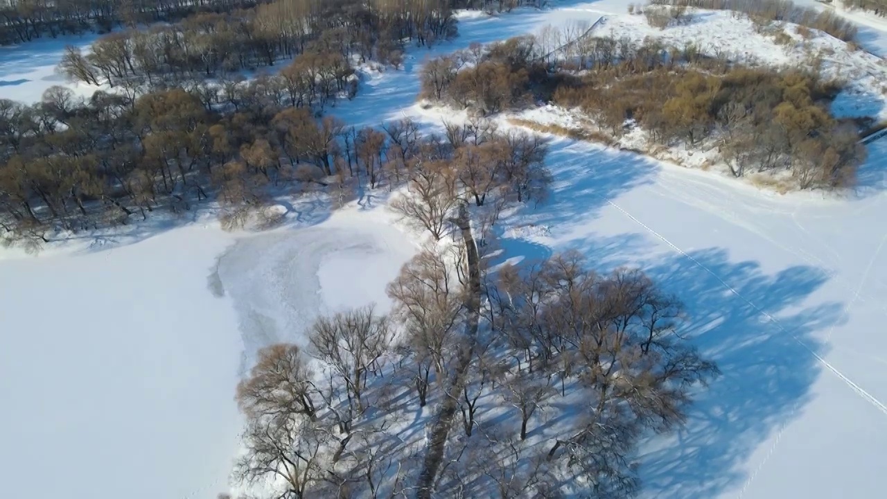 航拍雪后石拱桥光影视频素材