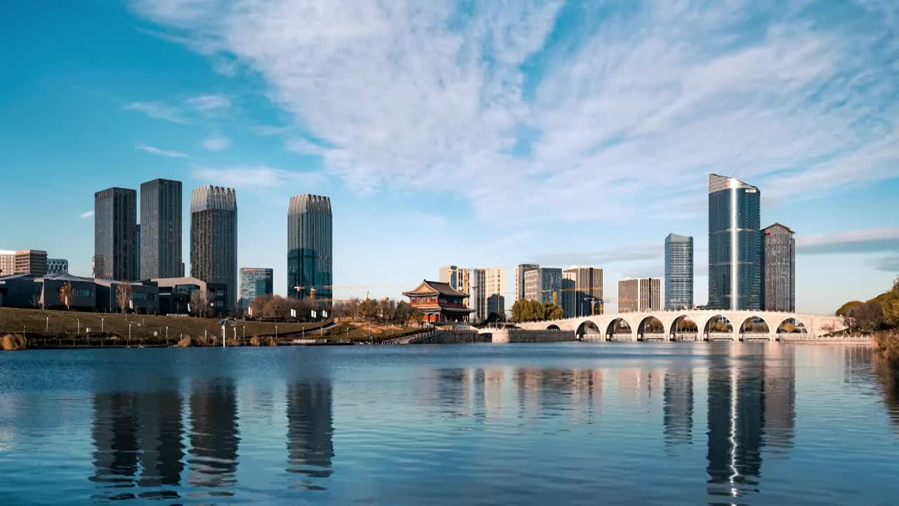 北京通州京杭大运河大光楼七孔桥城市建设延时云蓝天湖面河水城市副中心反射倒影环境建设建筑地标古桥古建筑视频素材