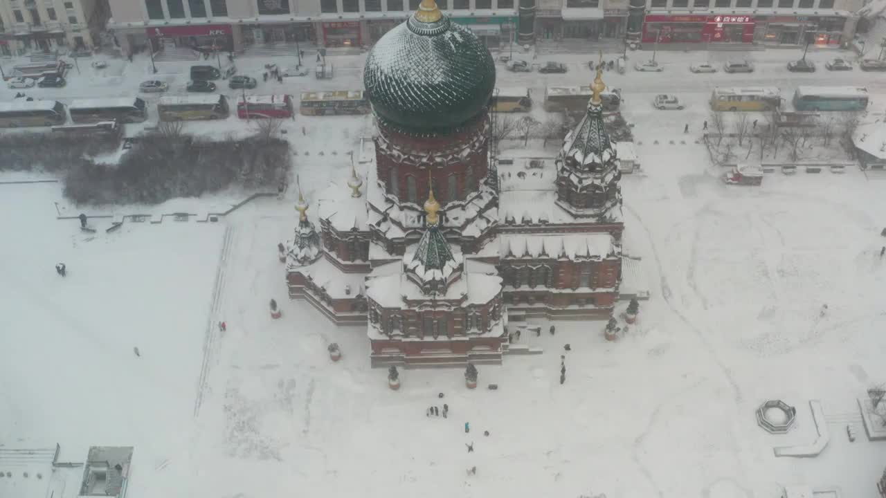 哈尔滨圣索菲亚教堂下雪航拍视频素材