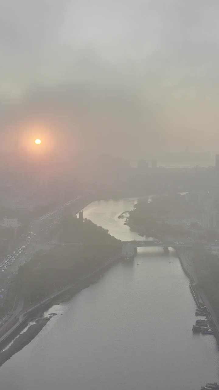 航拍海口海甸河落日余晖视频素材