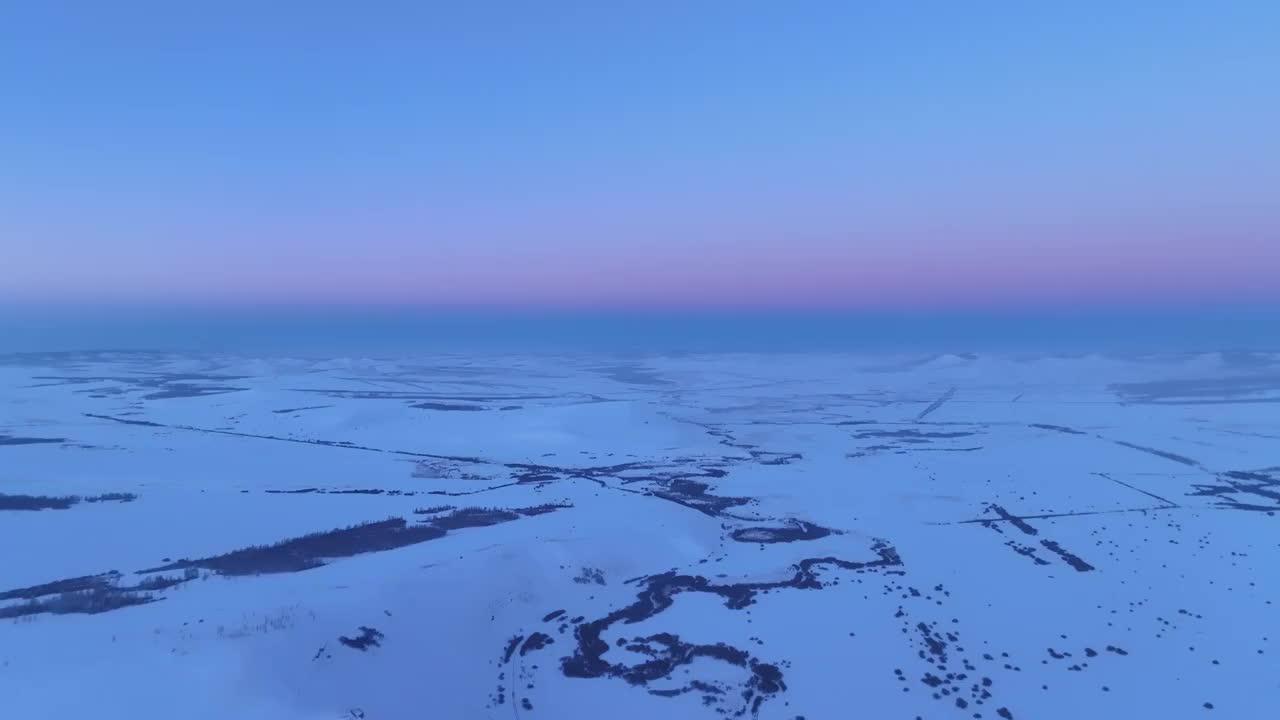 航拍呼伦贝尔雪域雪原河湾暮色视频素材