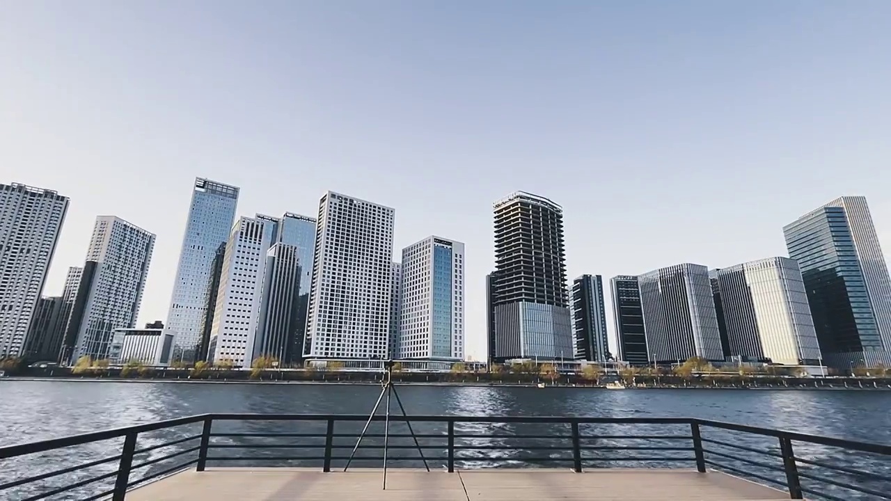 北京通州京杭大运河建筑群城市建设日出朝霞延时火烧云倒影水面湖面河面夜转日写字楼高层住宅视频素材