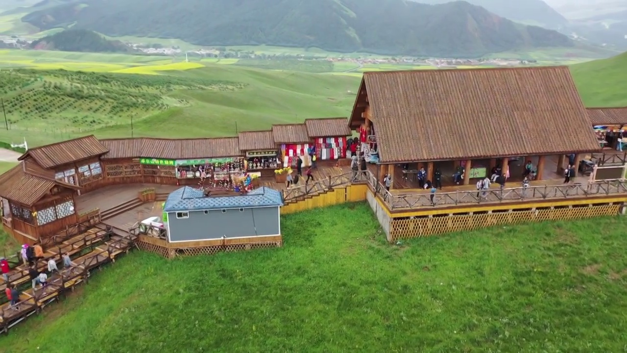 航拍青海祁连山卓尔山油菜花视频素材