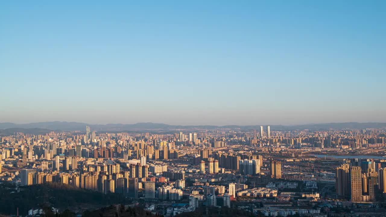 云南昆明高视角城市风光日转夜延时摄影视频素材