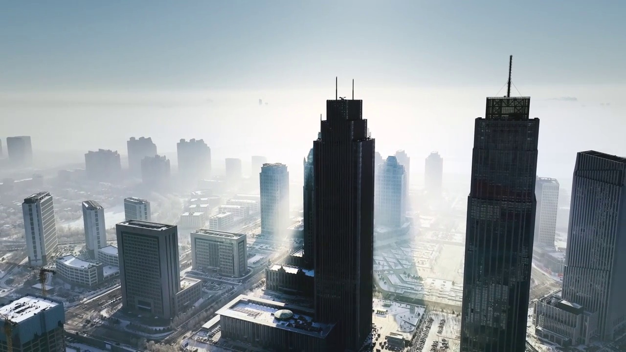 4K哈尔滨冬季春季摩天大楼冰雪城市航拍视频素材画面1