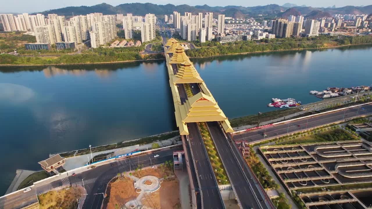 广西柳州凤凰岭大桥日落夕阳风雨桥城市建筑柳江风光航拍视频素材