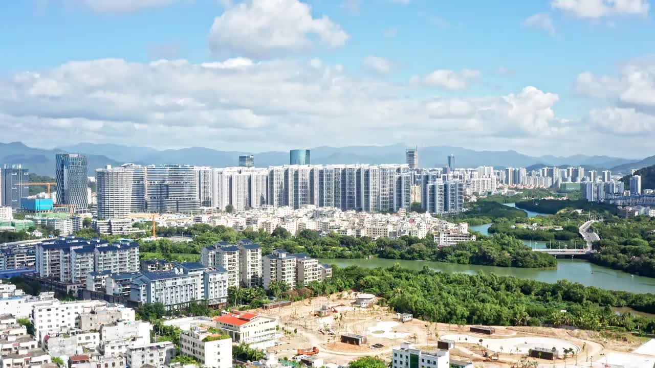 海南省三亚市三亚河两岸城市风光航拍视频素材