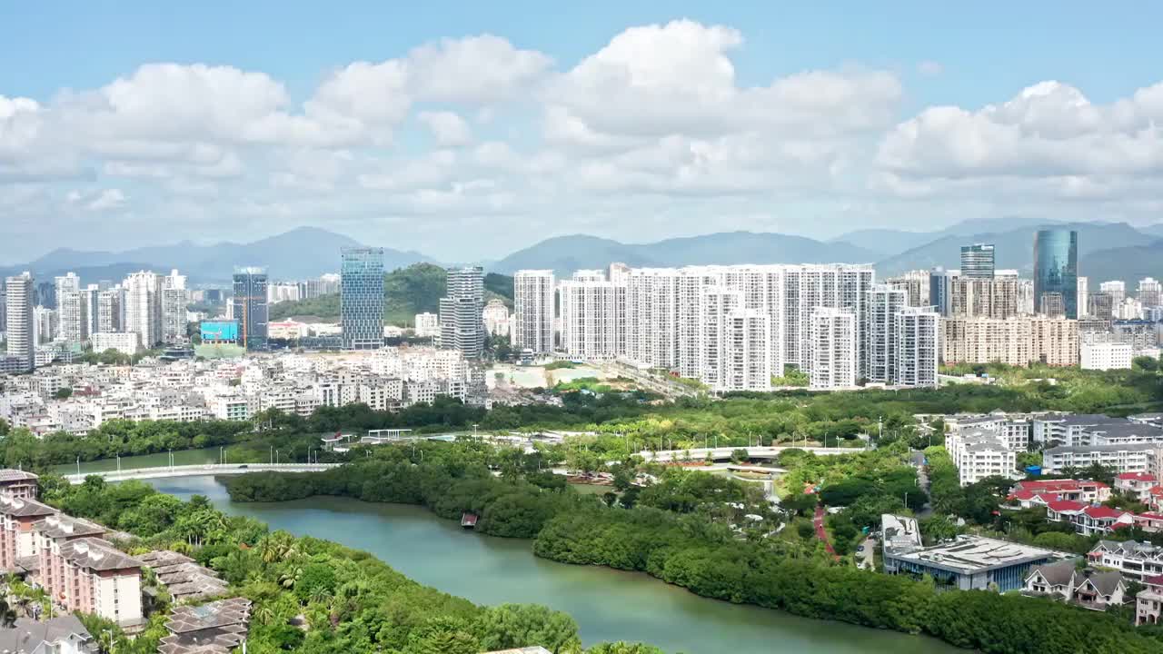 海南省三亚市三亚河两岸城市风光航拍视频素材