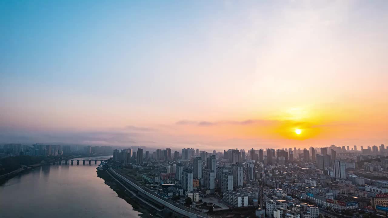 日出陕西安康城市天际线航拍延时视频素材