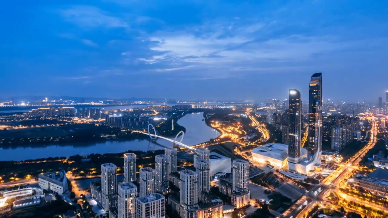 中国江苏南京河西区青奥中心保利大剧院天际线夜景航拍延时摄影视频素材