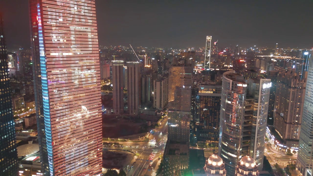 从半空俯瞰广州核心商圈现代城市建筑夜景亚洲国际顶级CBD岭南广州天河珠江新城密集办公楼地标建筑夜景视频素材