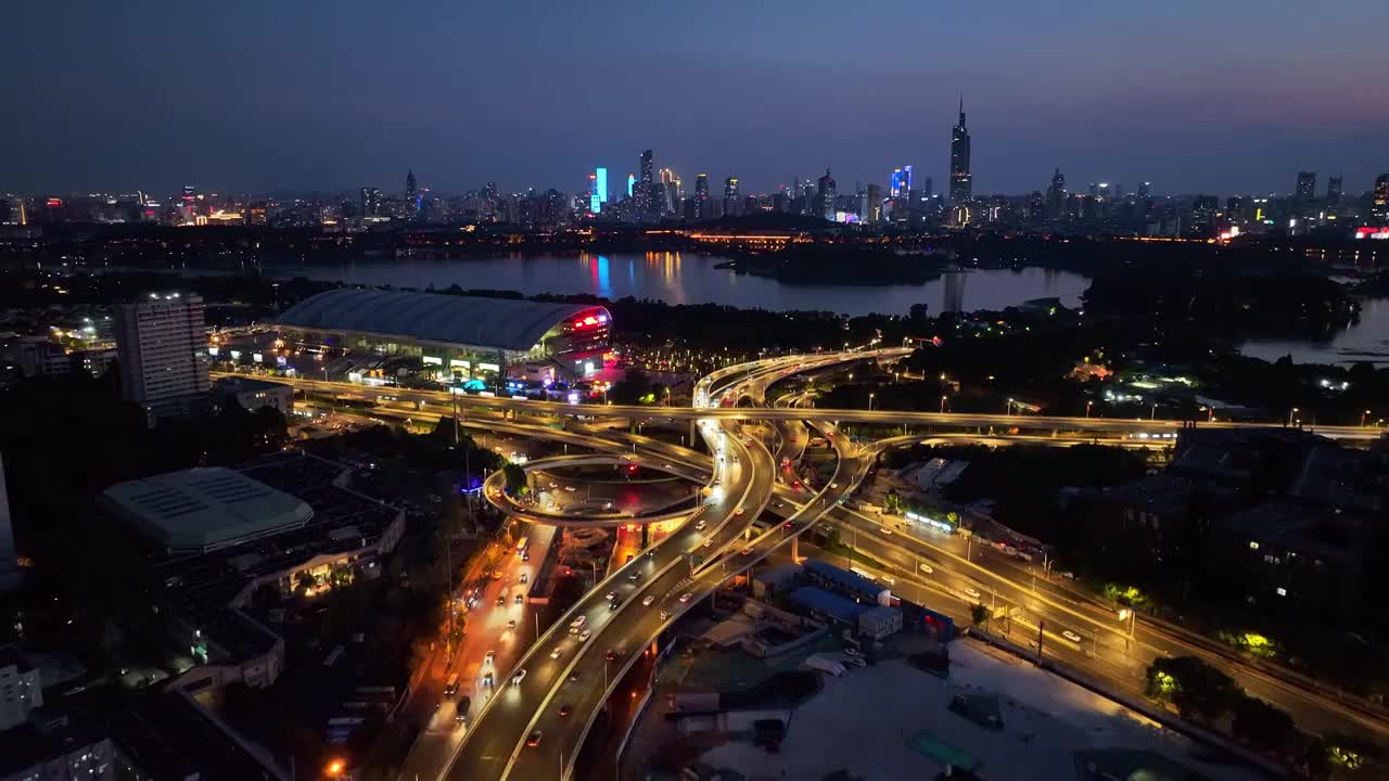 航拍南京城市天际线新庄立交桥夜景晚霞视频素材