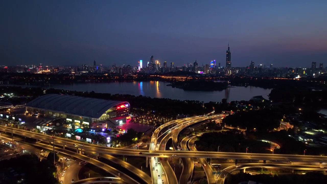 航拍南京城市天际线新庄立交桥夜景晚霞视频素材