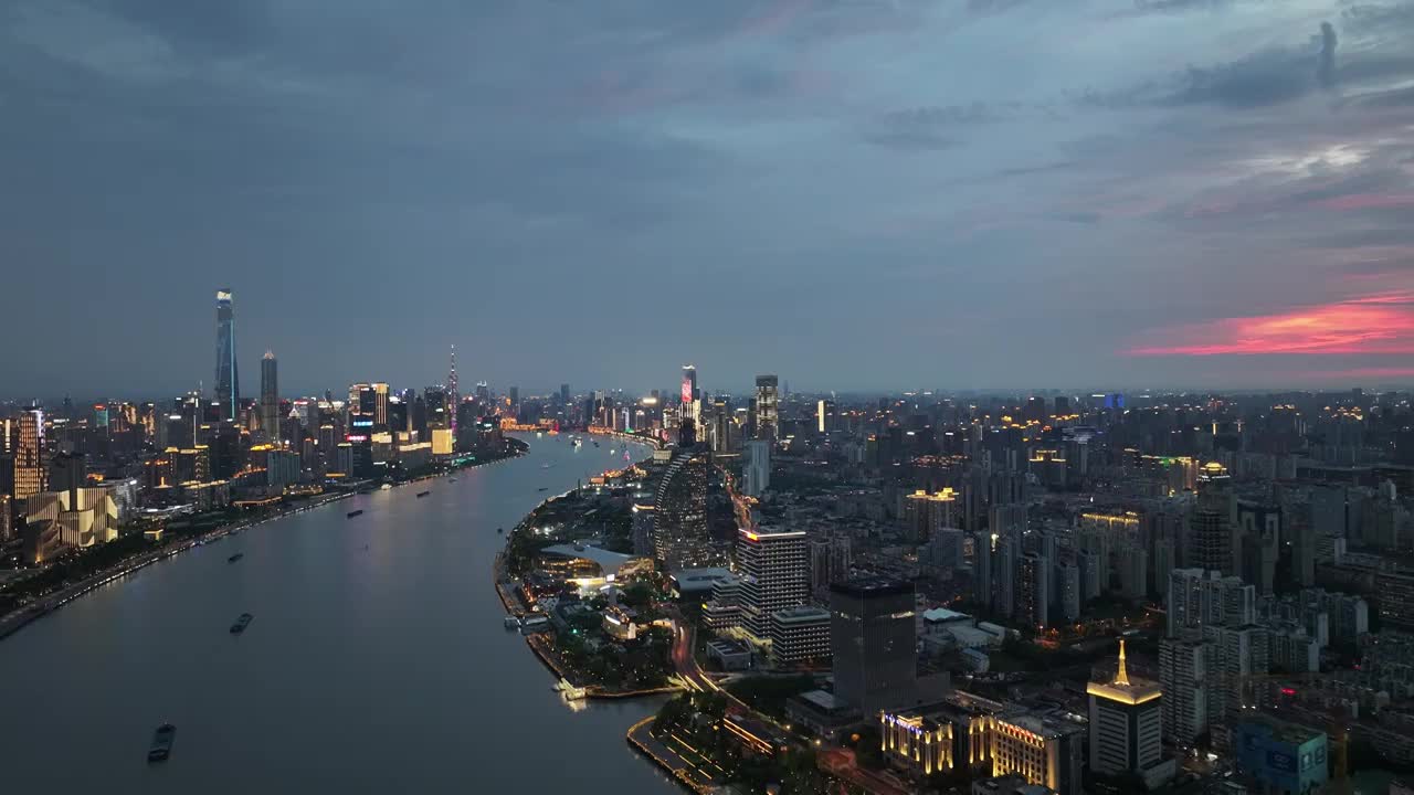 高空航拍黄浦江外滩方向夜景城市灯光秀蓝调时刻视频素材