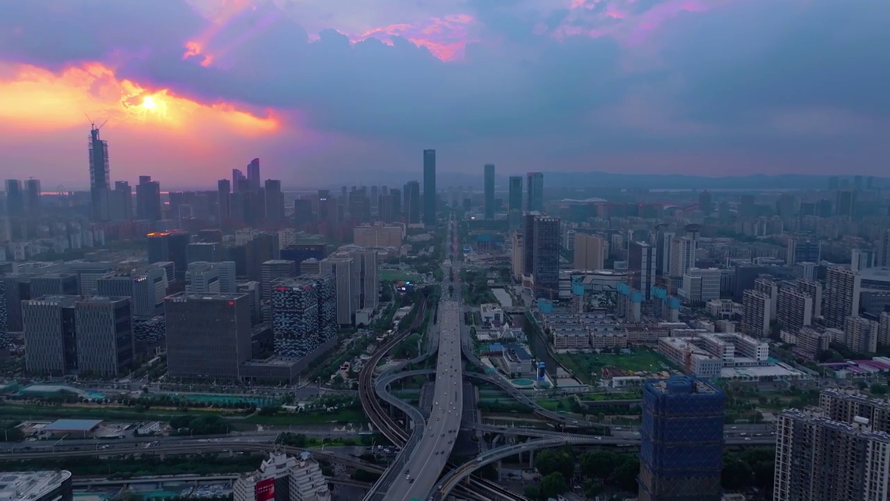 航拍南京晚霞中的城市建筑道路视频素材