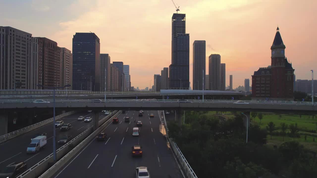 天津海河海津大桥沿岸城市建筑日落风光航拍视频素材