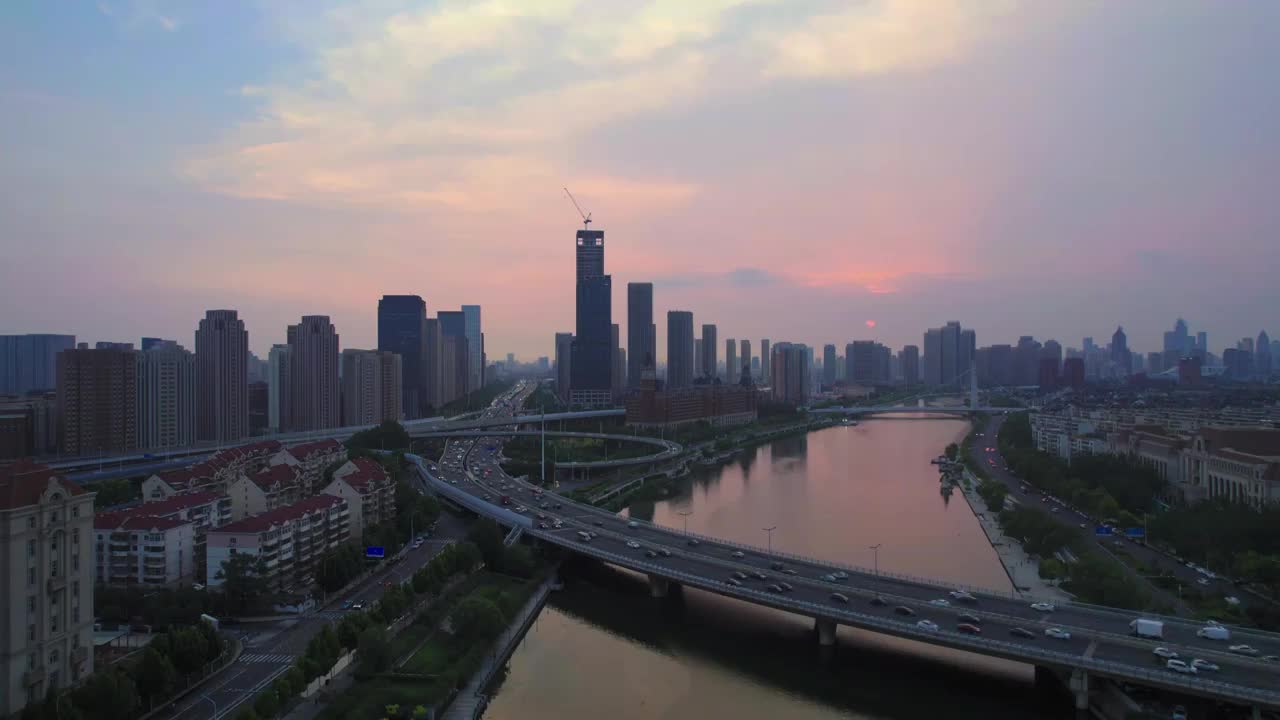 天津海河海津大桥沿岸城市建筑日落风光航拍视频素材