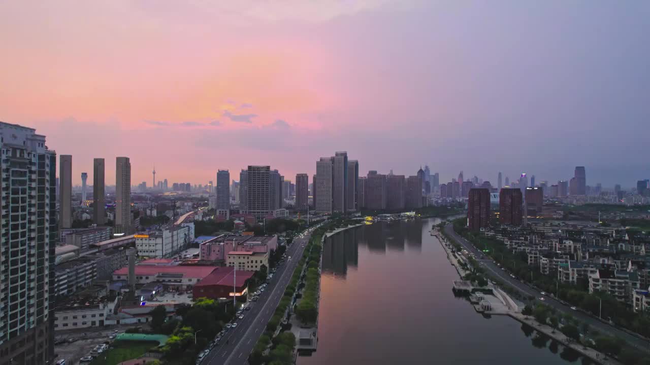 天津海河富民桥沿岸城市建筑日落风光航拍视频素材