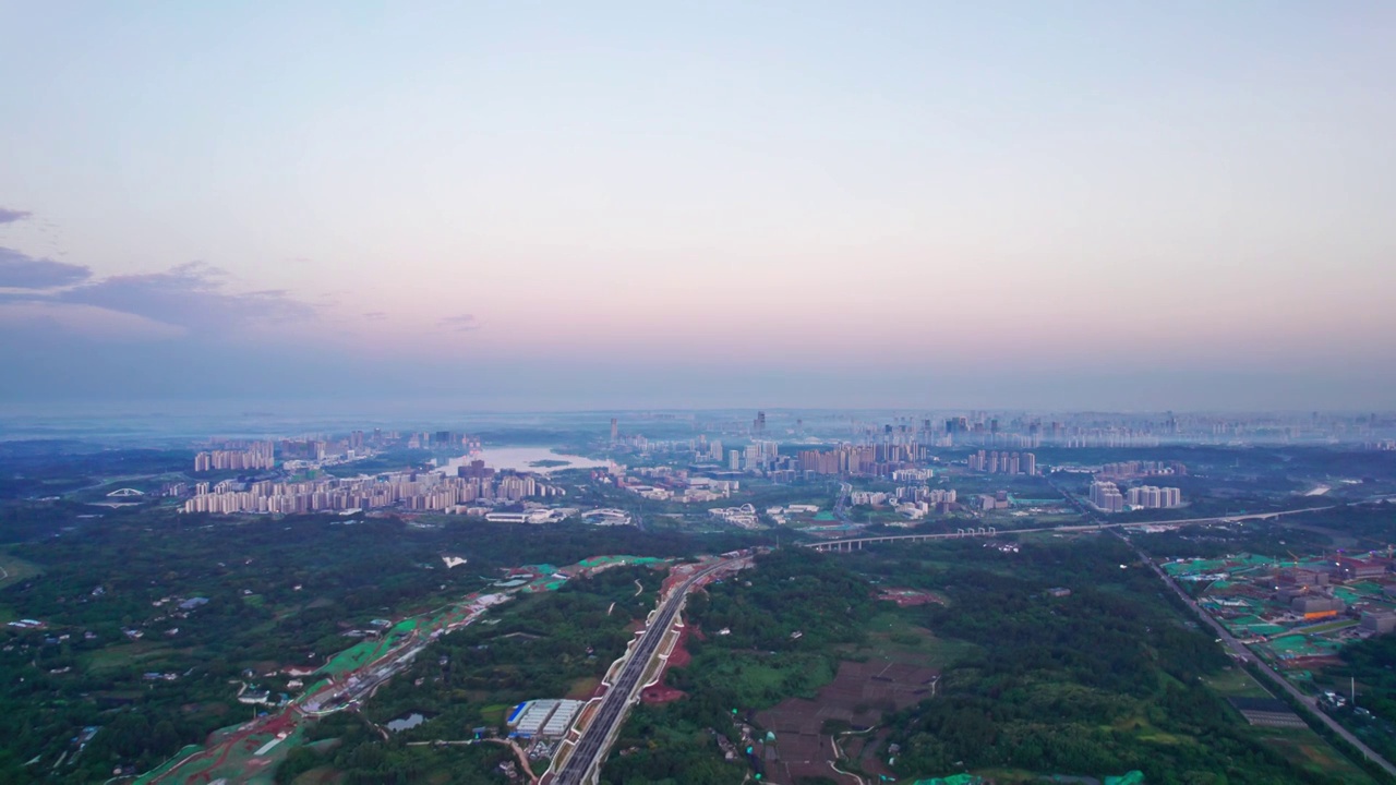 成都天府新区兴隆湖科学城和西博城建筑群日出城市风光航拍实时视频素材