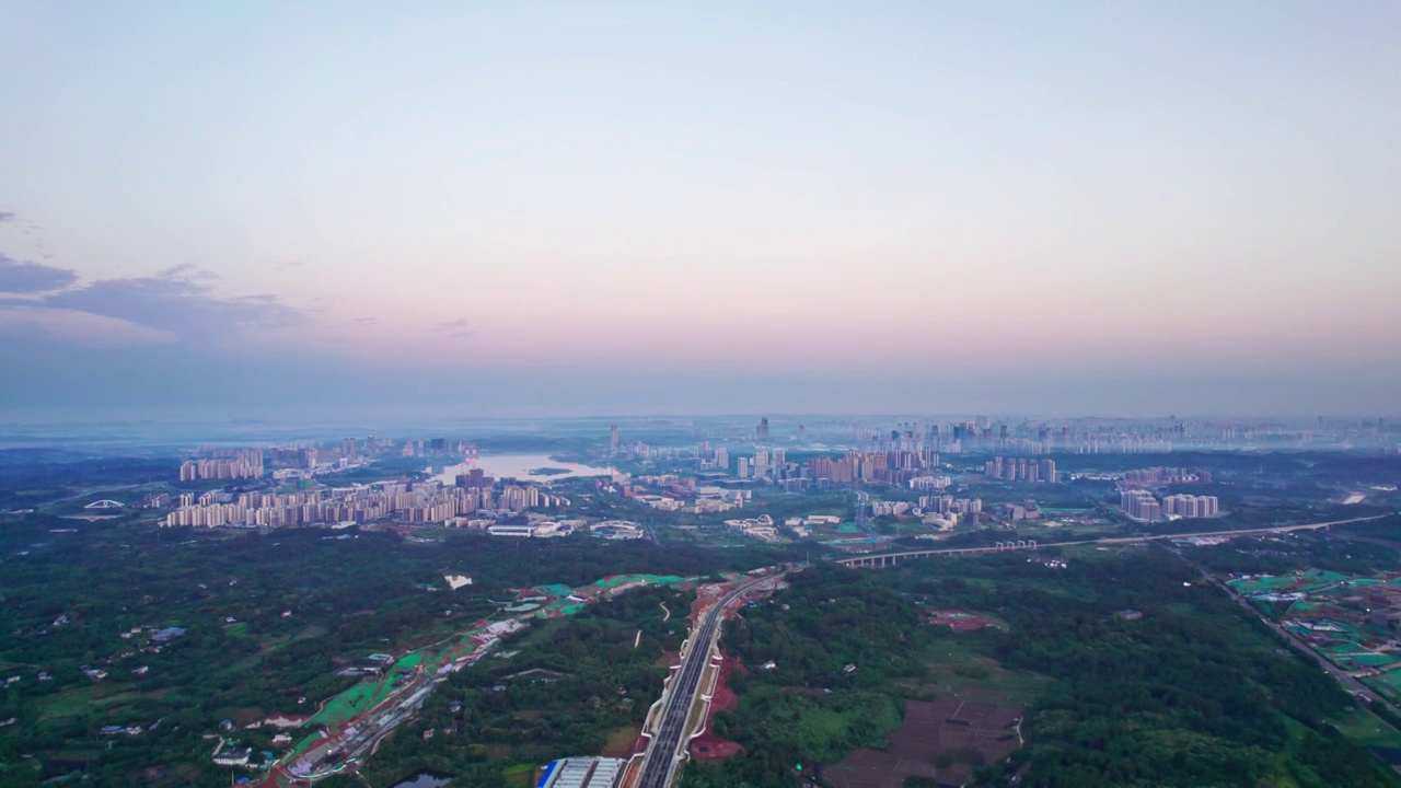 成都天府新区兴隆湖科学城和西博城建筑群日出城市风光航拍实时视频素材