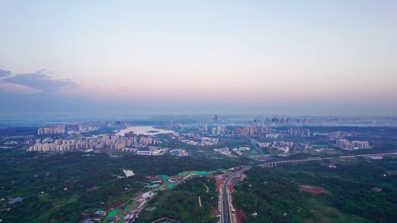 成都天府新区兴隆湖科学城和西博城建筑群日出城市风光航拍实时视频素材