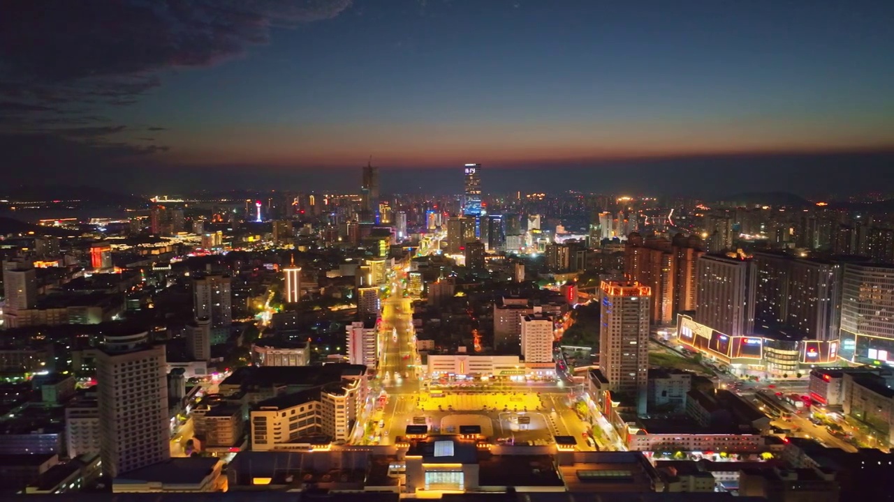 航拍徐州市主城区夕阳晚霞苏宁广场德基广场黄河观光带全景视频素材