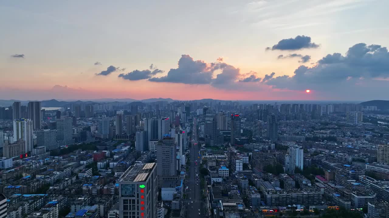 航拍徐州市主城区夕阳晚霞苏宁广城市宣传全景视频素材